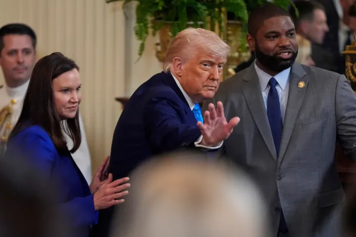 President Donald Trump departs with Rep. Byron Donalds, R-Fla., 
