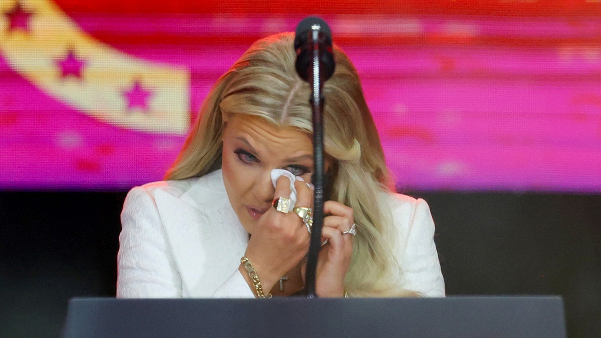 Erika Kirk cries during a memorial for her husband