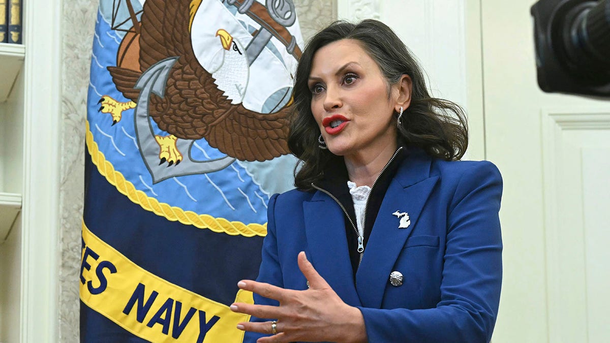 Whitmer gestures to Trump (not seen) in Oval Office