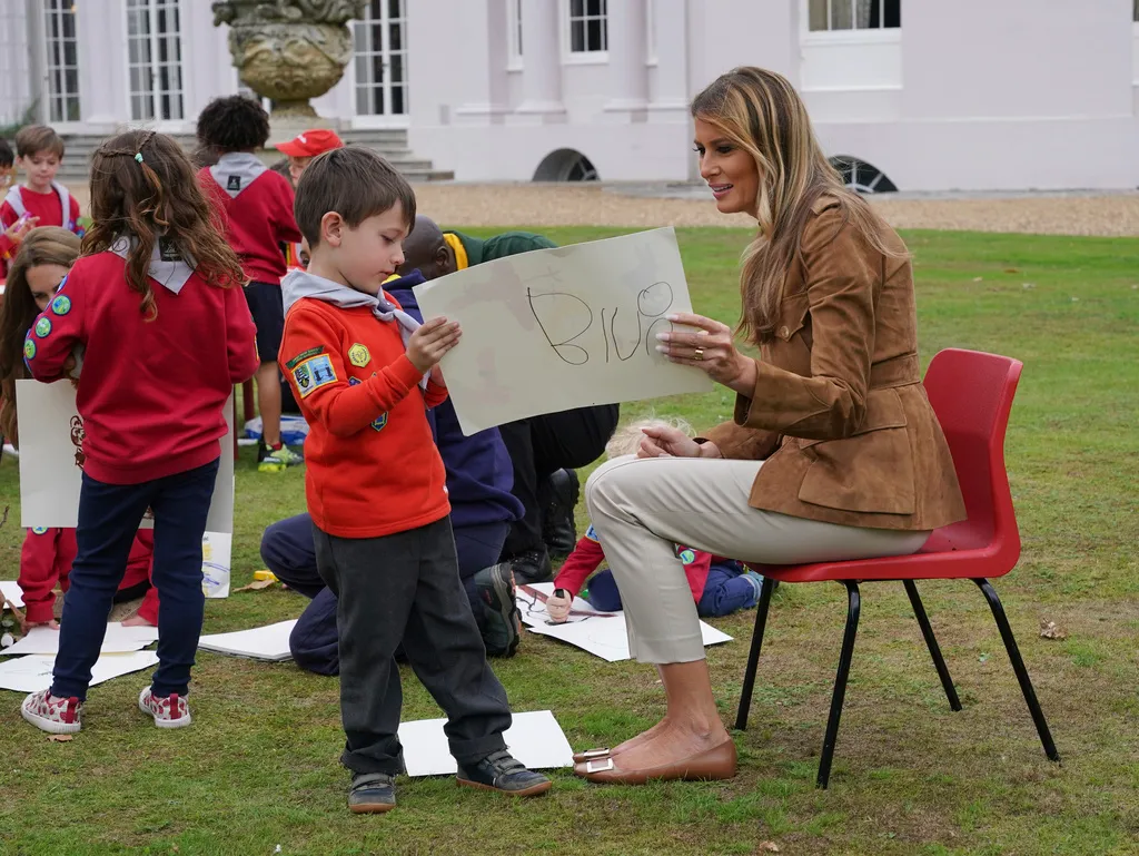 First lady Melania Trump meets members of the Scouts' Squirrels program in Frogmore Gardens.