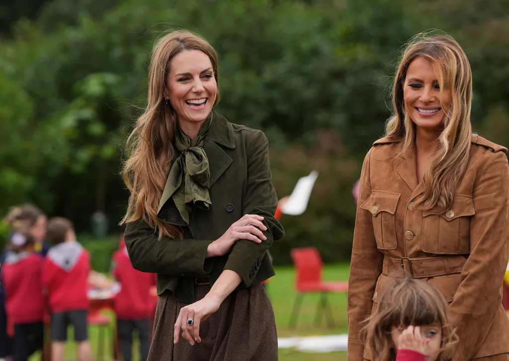 Britain's Kate, Princess of Wales, left, and first lady Melania Trump meet members of the Scouts' Squirrels program in Frogmore Gardens.