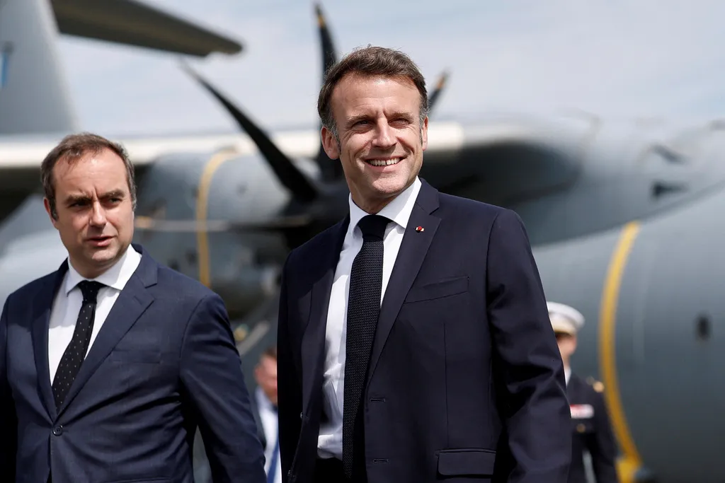 Then-Defense Minister Sebastien Lecornu receives President Emmanuel Macron at the 55th International Paris Airshow at Le Bourget Airport.