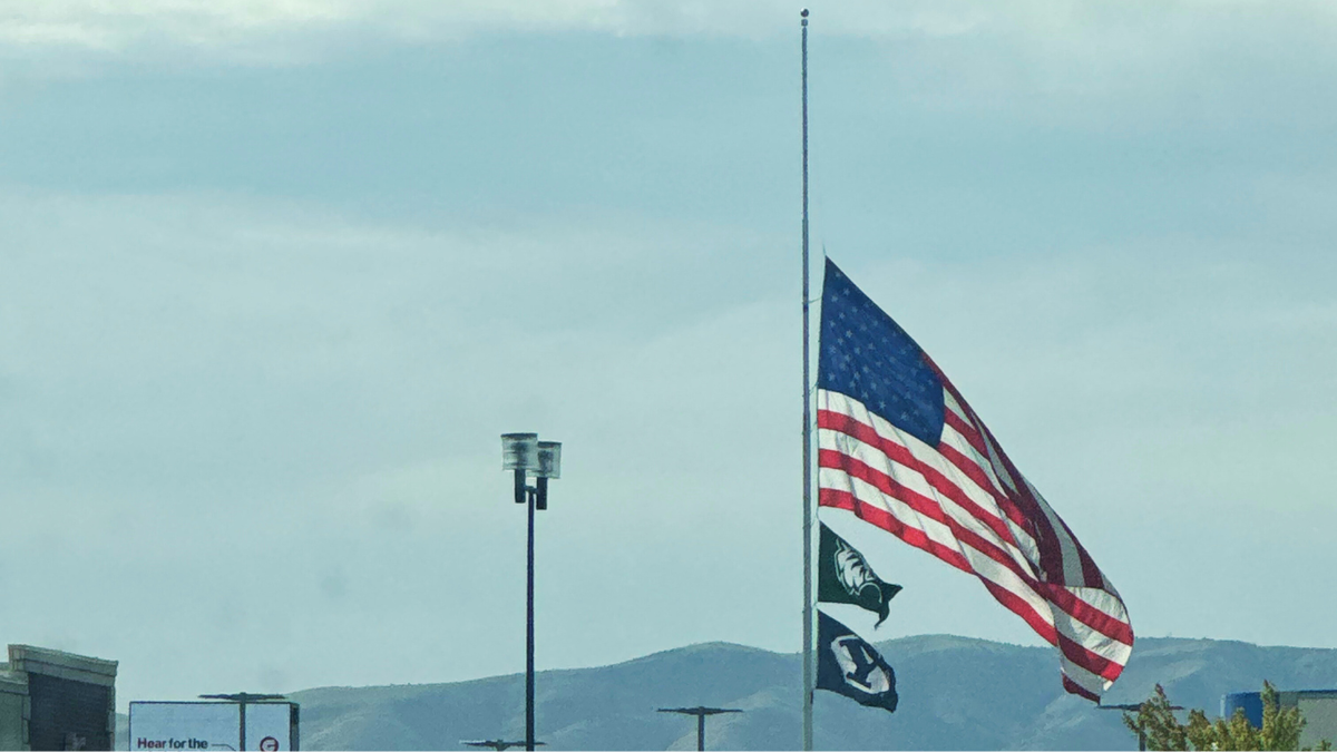A U.S. flag flying at half-staff in Orem, Utah