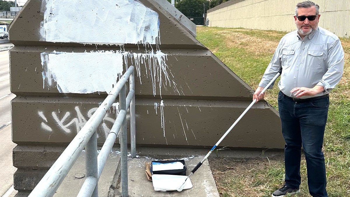 Sen. Ted Cruz photographed after painting over anti-Charlie Kirk graffiti