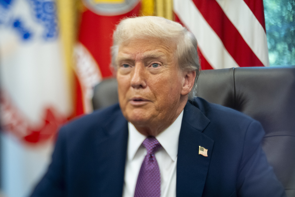 President Donald Trump speaks in the Oval Office.