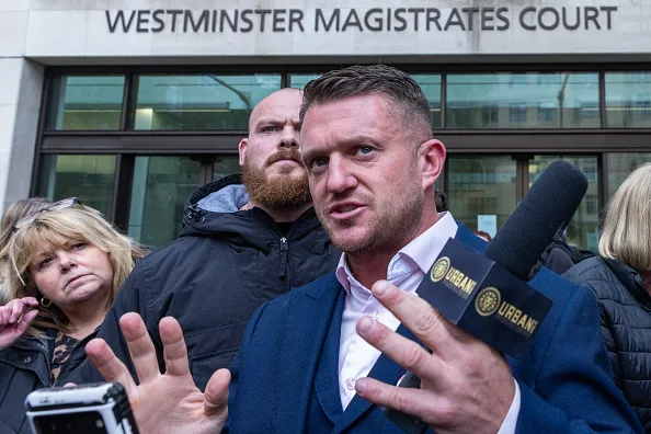 Tommy Robinson speaks outside Westminster Magistrates Court after being cleared of having breached a dispersal order under Section 35 of the Crime and Policing Act of 2014