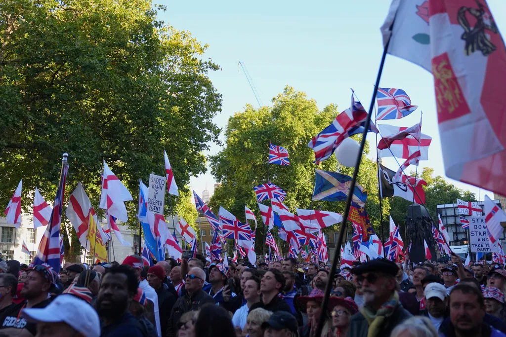 People demonstrate during the Tommy Robinson-led Unite the Kingdom march and rally.