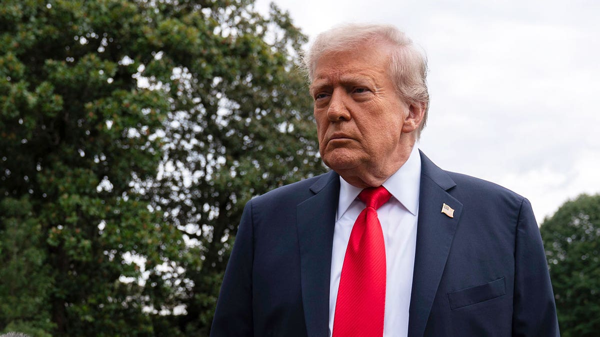 Trump speaks to reporters at the White House