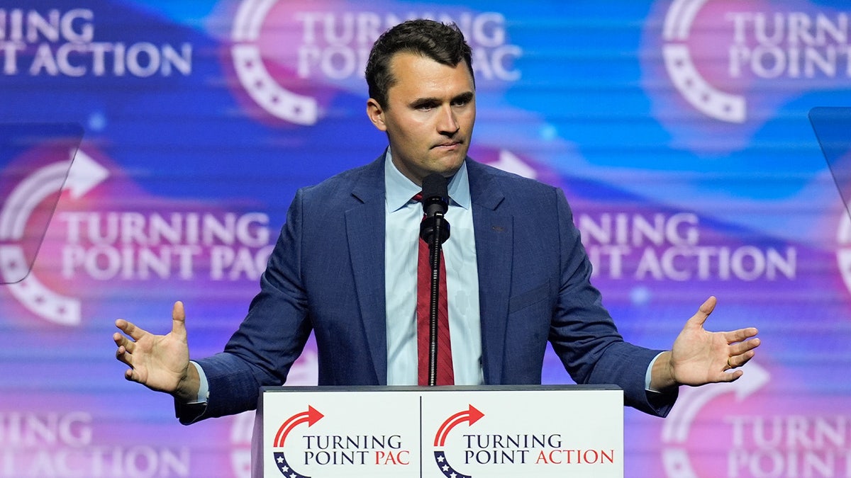 Charlie Kirk speaks at a TPUSA event