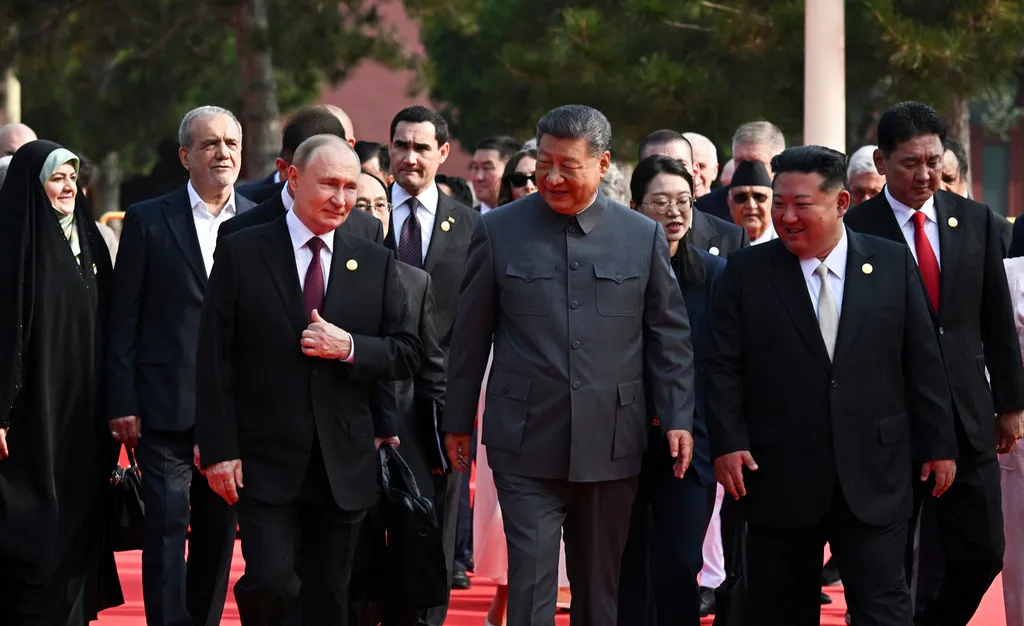 From left in the front row: Russian President Vladimir Putin, Chinese President Xi Jinping, and North Korean leader Kim Jong Un walk after a joint photo session of the heads of foreign delegations invited to the military parade to mark the 80th anniversary of Japan's World War II surrender, in Beijing, Wednesday, Sept. 3, 2025.
