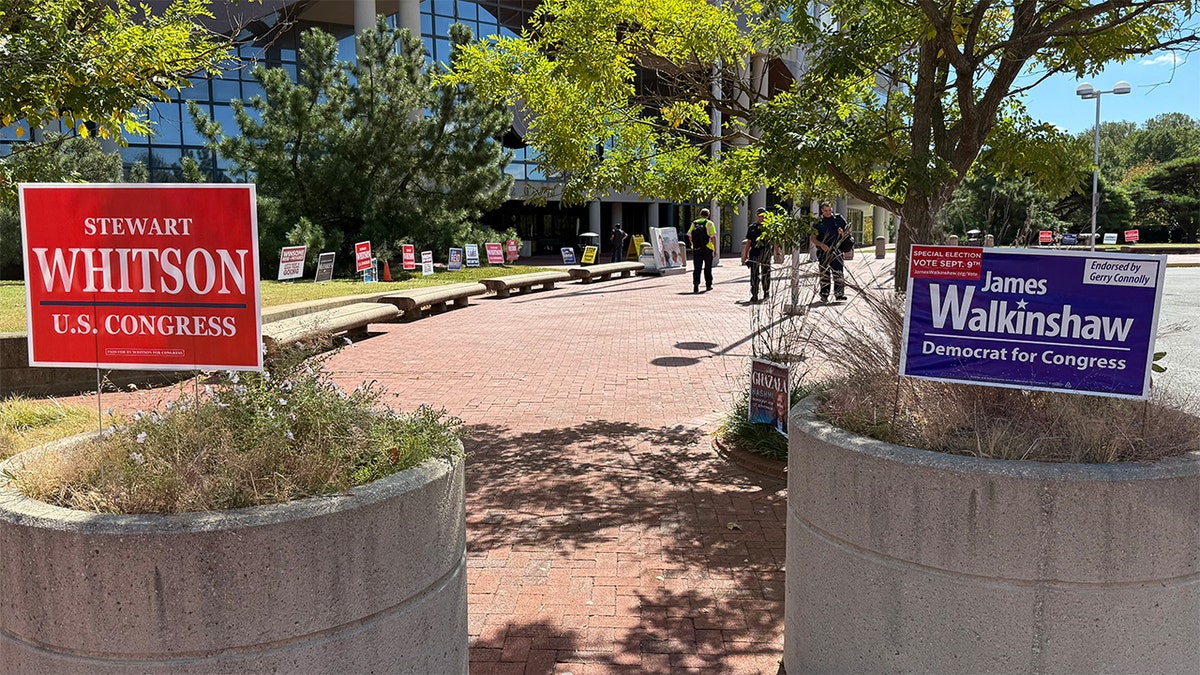 Stewart Whitson and James Walkinshaw campaign signs