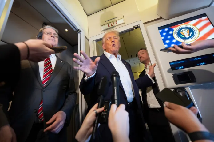 President Donald Trump, joined by Treasury Secretary Scott Bessent and U.S. Trade Representative Jamieson Greer, speaks to reporters aboard Air Force One.