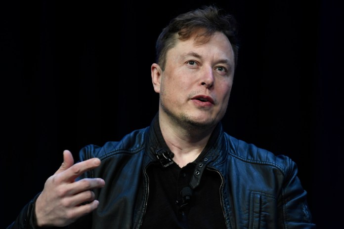 Tesla and SpaceX CEO Elon Musk speaks at the SATELLITE Conference and Exhibition in Washington, March 9, 2020. An air quality board has ordered electric car manufacturer Tesla to stop illegally polluting the air in the San Francisco Bay Area. (AP Photo/Susan Walsh, File)