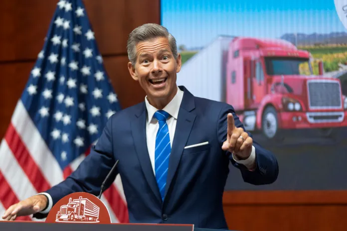 Transportation Secretary Sean Duffy speaks during a news conference at the U.S. Department of Transportation headquarters, announcing formal action against three states for failing to enforce federal English Language Proficiency (ELP) requirements for commercial motor vehicle drivers, Tuesday, Aug. 26, 2025, in Washington. (AP Photo/Manuel Balce Ceneta)