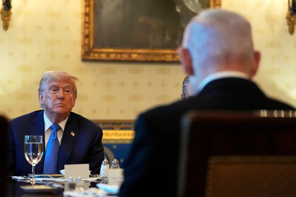 President Donald Trump listens during a meeting with Israeli Prime Minister Benjamin Netanyahu.