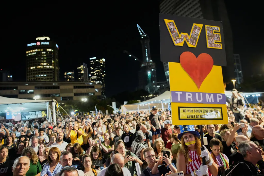 People gather to celebrate following the announcement that Israel and Hamas have agreed to the first phase of a peace plan.