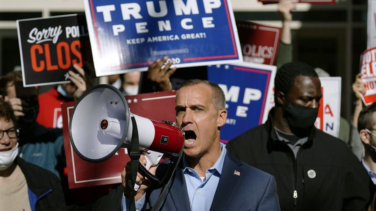 Corey Lewandowski, center, speaks at Trump campaign event following the 2020 presidential election, on Thursday, Nov. 5, 2020, in Philadelphia.