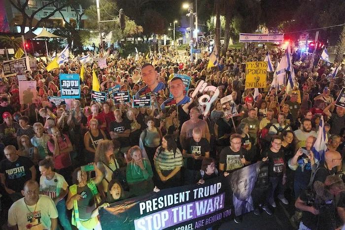 Demonstrators march in Tel Aviv, Israel, on Tuesday, Sept. 30, 2025, calling for the immediate release of all hostages.