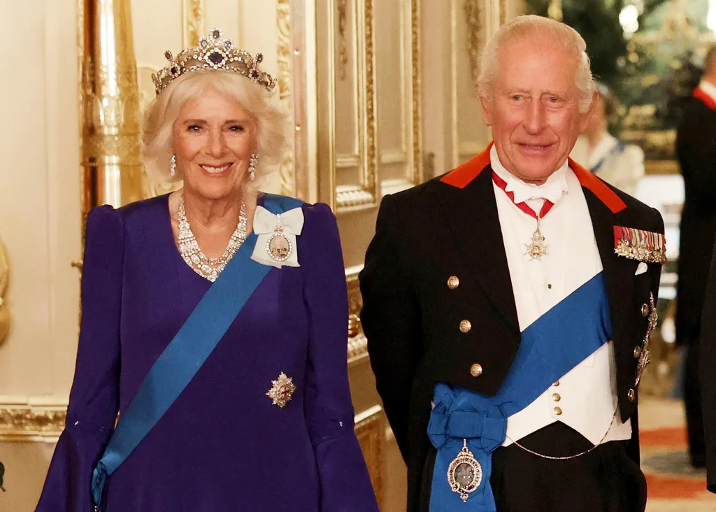 Britain's Queen Camilla, left, and King Charles III, right, pose for a photo before a state banquet