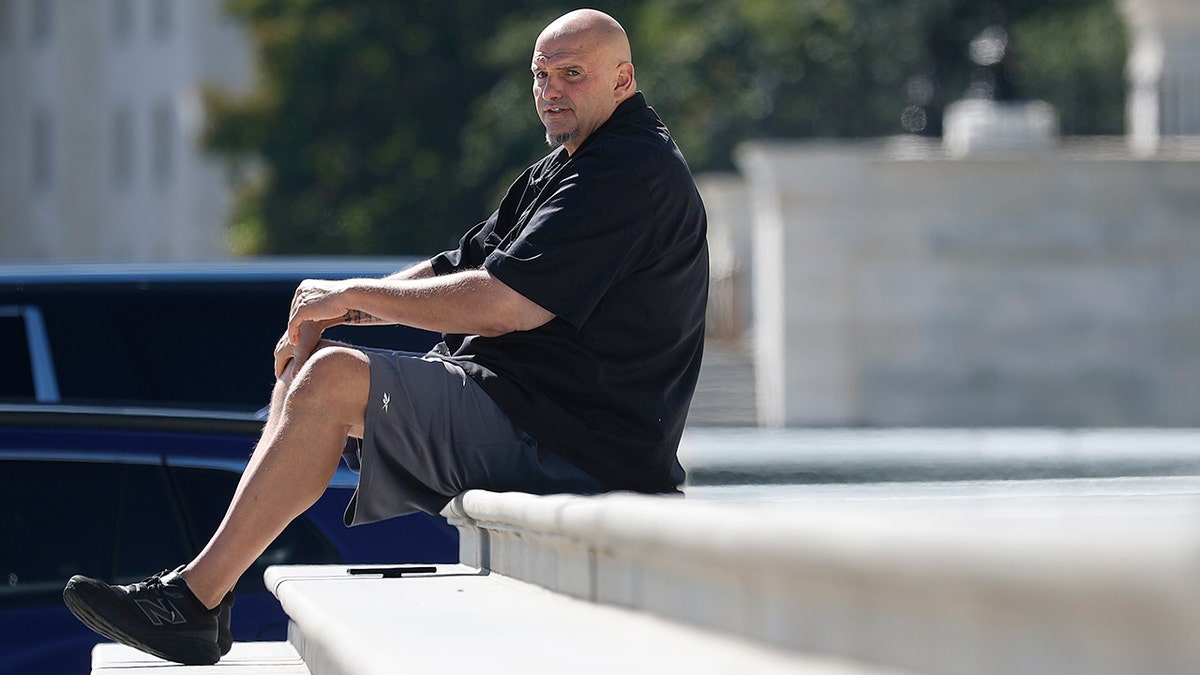 Sen. John Fetterman sitting on steps