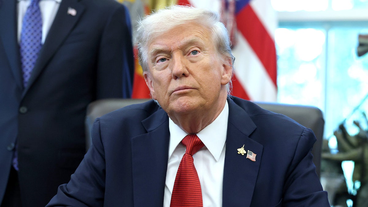 Donald Trump answers questions in Oval Office