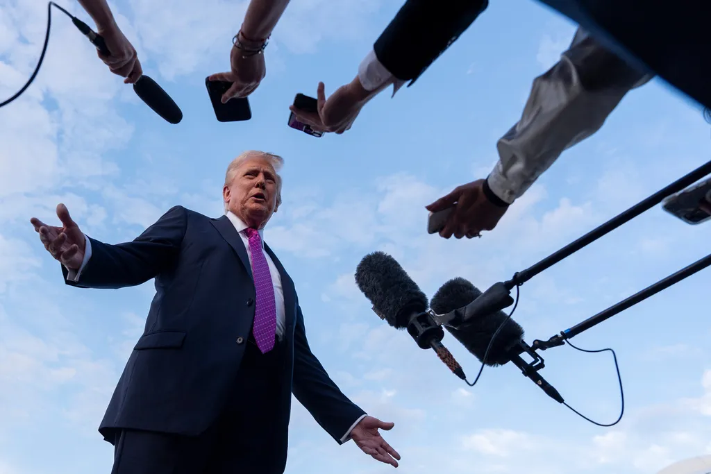 President Donald Trump speaks with reporters before he departs on Air Force One at Morristown Airport, Sunday, Sept. 14, 2025, in Morristown, N.J.