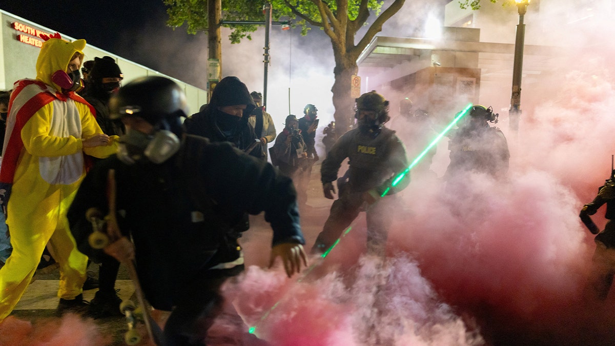 Law enforcement and protesters clash in Portland