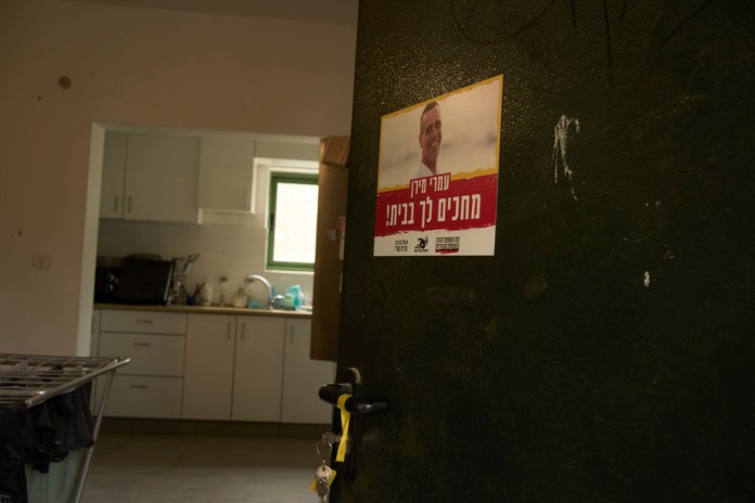 A poster depicting Omri Miran, who is held captive by Hamas in the Gaza Strip, at the family's 