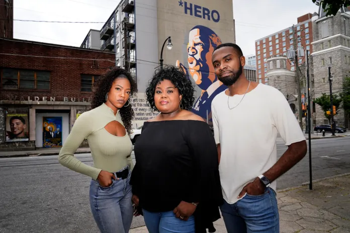 D'Zhane Parker, left, Cicley Gay, center, and Shalomyah Bowers of Black Lives Matter Global Network Foundation Inc. pose for a portrait.