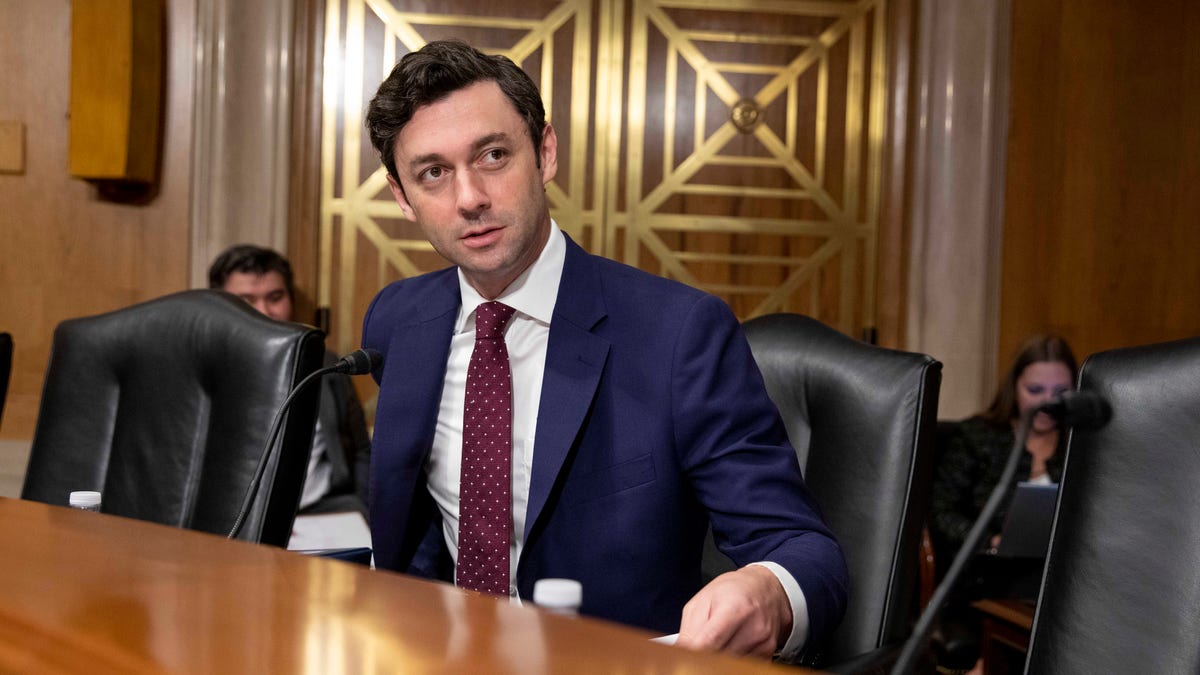 Sen. Jon Ossoff arrives before a subcommittee hearing, Sept. 13, 2023, on Capitol Hill in Washington.