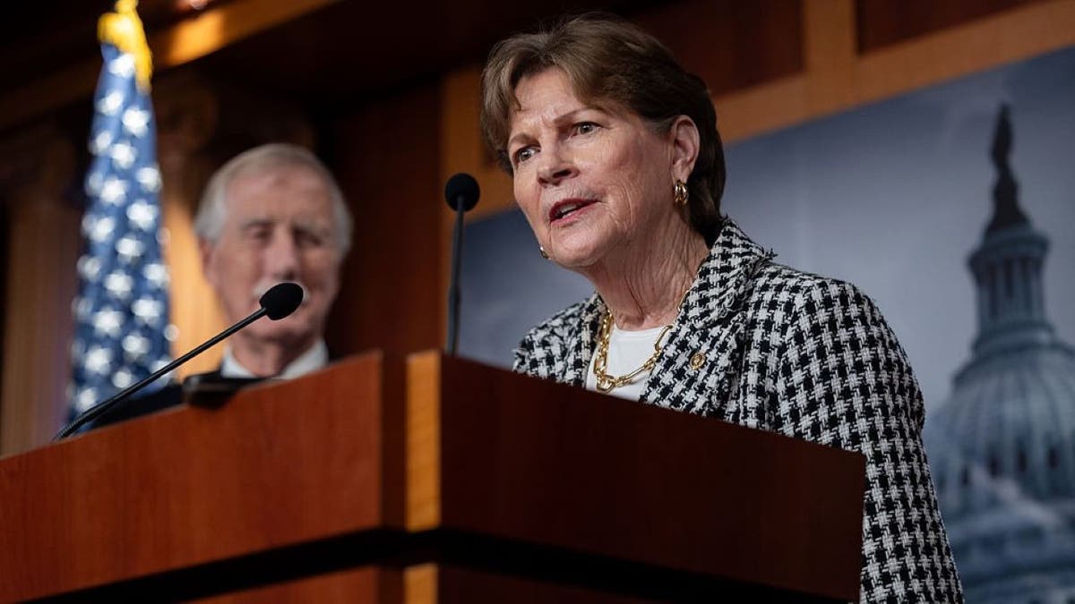 Sen. Jeanne Shaheen standing at a podium
