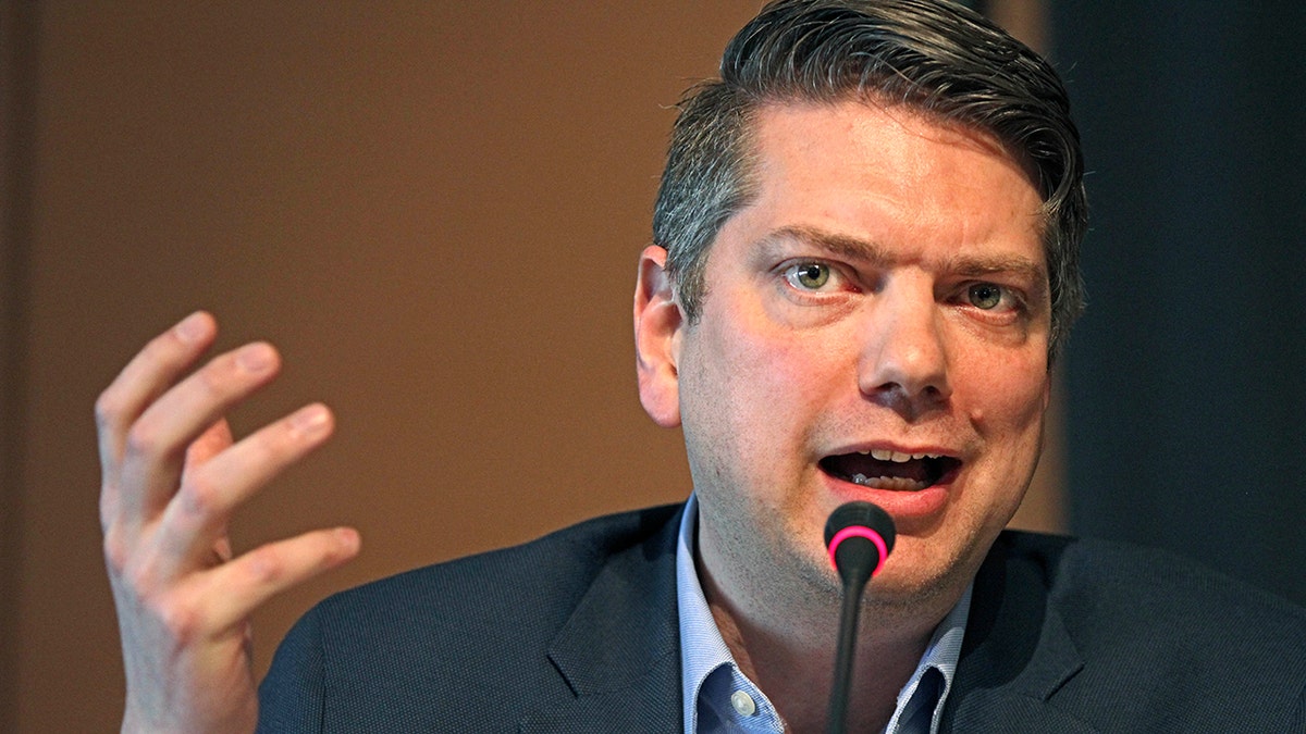 Rep. Nick Begich III gesturing while speaking.