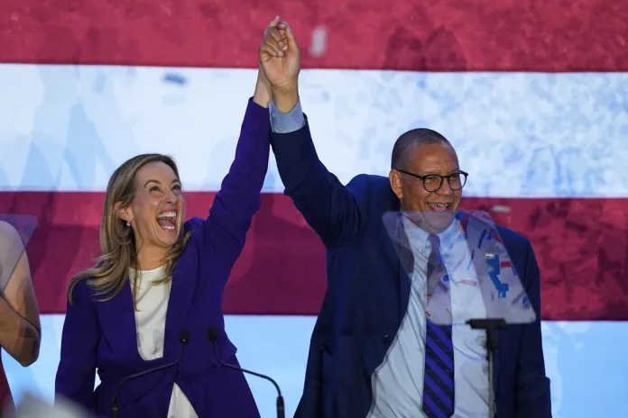 New Jersey Democratic Gov.-elect Mikie Sherrill and Lt. Gov.-elect Dale Caldwell celebrate
