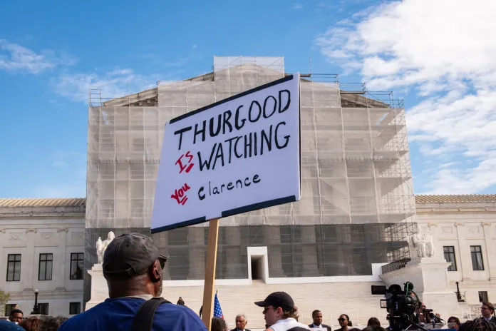 Protesters demonstrate in front of the Supreme Court.