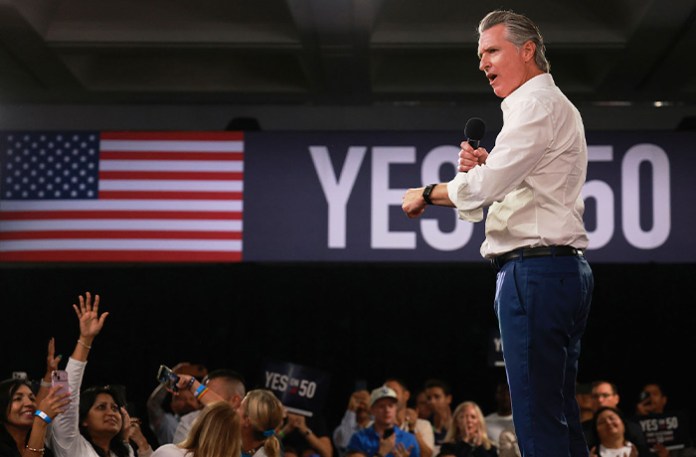 Gov. Gavin Newsom (D-CA) speaks on Proposition 50 during a campaign event in Los Angeles, California on Nov. 1. (Ethan Swope/AP)