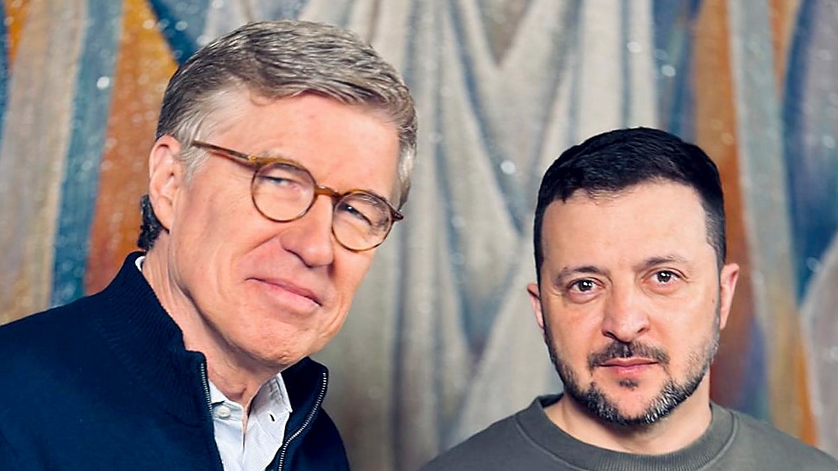 Greg Palkot standing next to Volodymyr Zelenskyy.