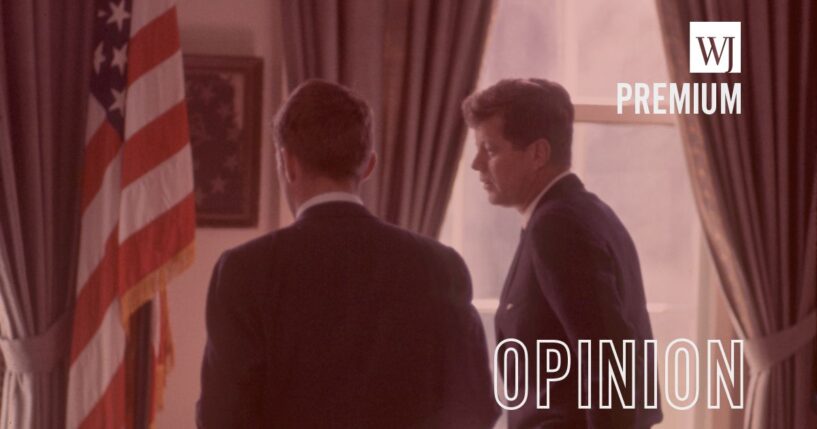 Attorney General Robert F. Kennedy, and his brother, President John F. Kennedy, confer in the Oval Office of the White House in 1962.