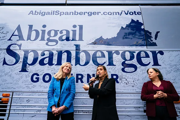 Former Representative Abigail Spanberger, Democratic gubernatorial candidate for Virginia, from left, Senator Elissa Slotkin, a Democrat from Michigan, and Representative Jennifer McClellan, a Democrat from Virginia, during a "Rams for Spanberger" campaign event with Virginia Commonwealth University (VCU) students at Monroe Park in Richmond, Virginia, US, on Monday, Nov. 3, 2025. Abigail Spanberger will face off with Winsome Earle-Sears on November 4, giving the state its first female governor. 