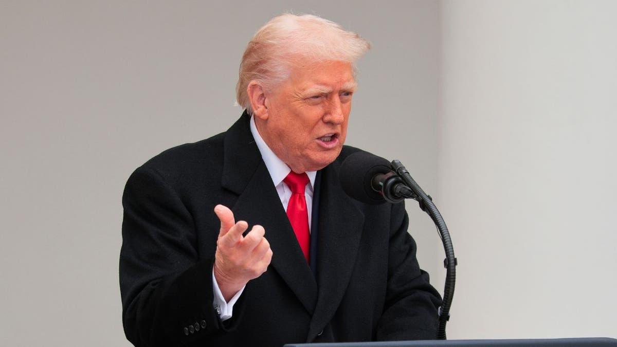 President Trump speaking at podium.