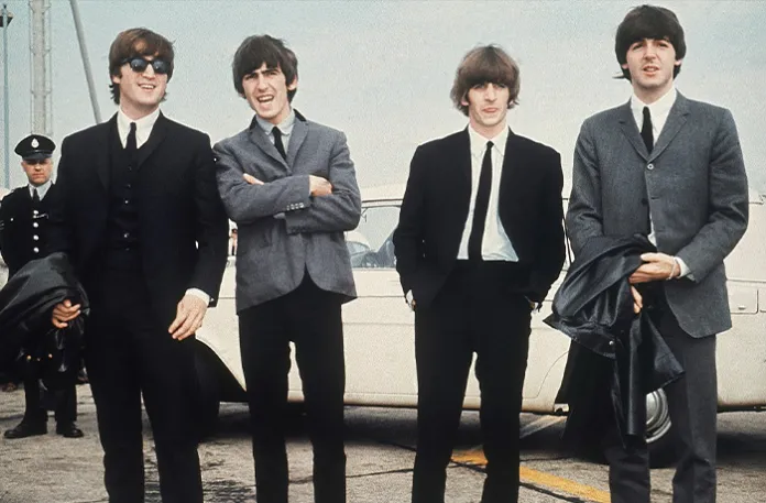 The Beatles, from left, John Lennon, George Harrison, Ringo Starr and Paul McCartney arrive in Liverpool, England, July 10, 1964. (AP Photo)