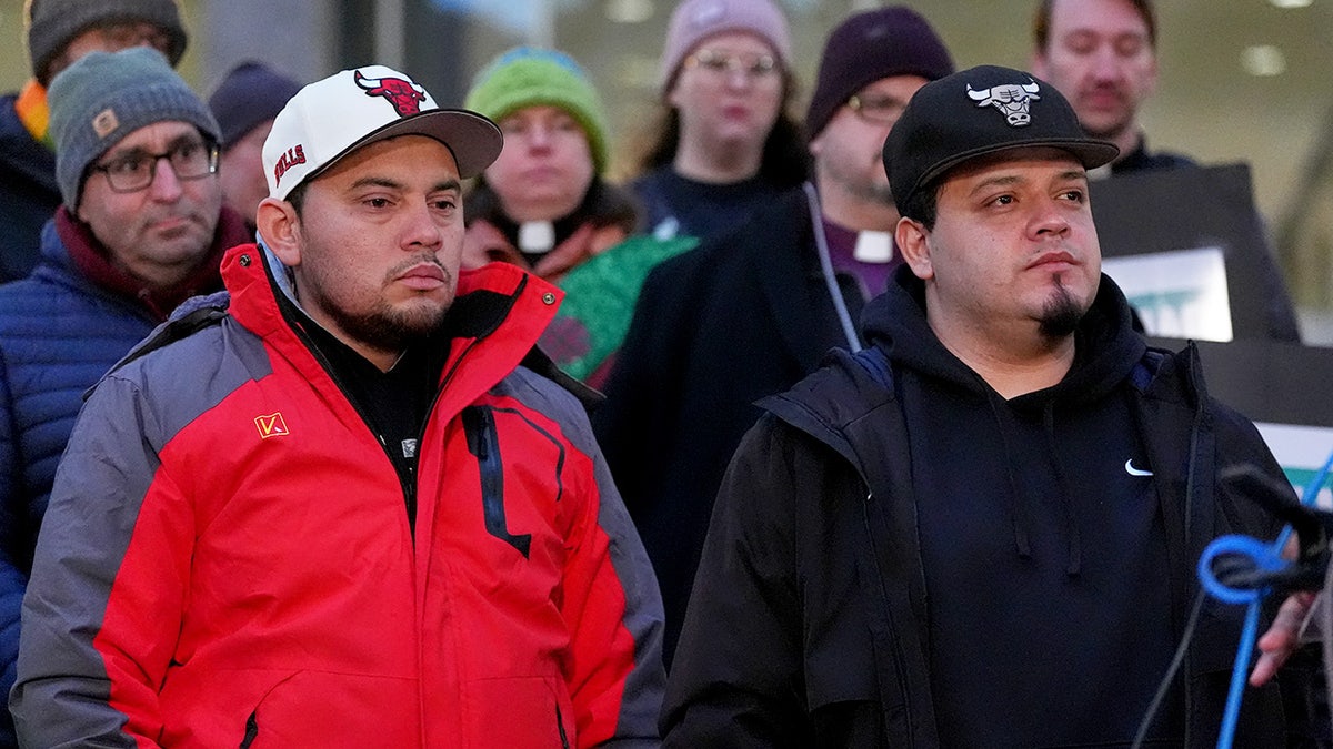 Kilmar Abrego Garcia listens during rally outside ICE facility in Baltimore