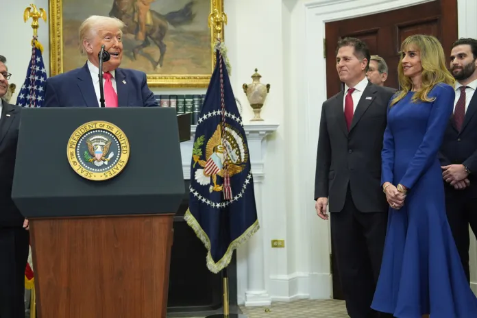 President Donald Trump speaks during an event on "Trump Accounts" for kids in the Roosevelt Room of the White House as Michael Dell and his wife, Susan look on, Tuesday, Dec. 2, 2025, in Washington.