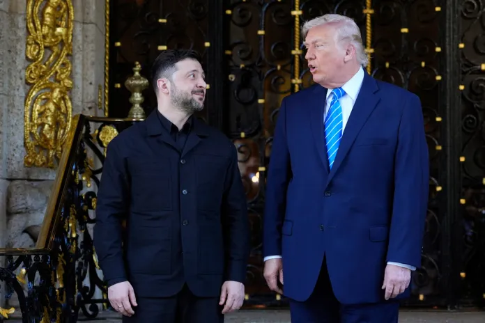 President Donald Trump greets Ukrainian President Volodymyr Zelensky at his Mar-a-Lago club.