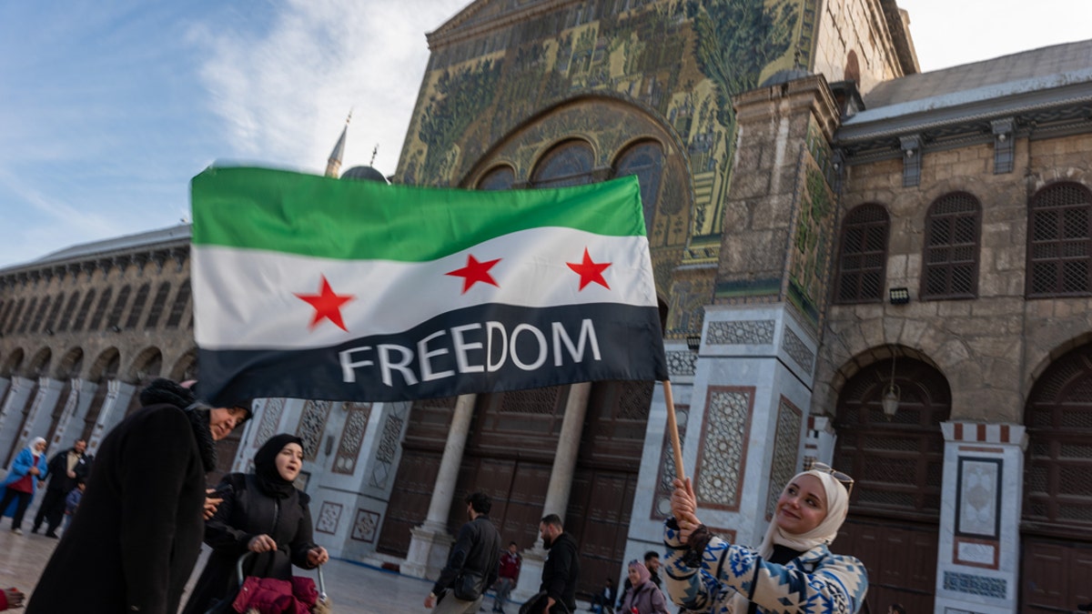 Syrian celebrate overthrow of Assad