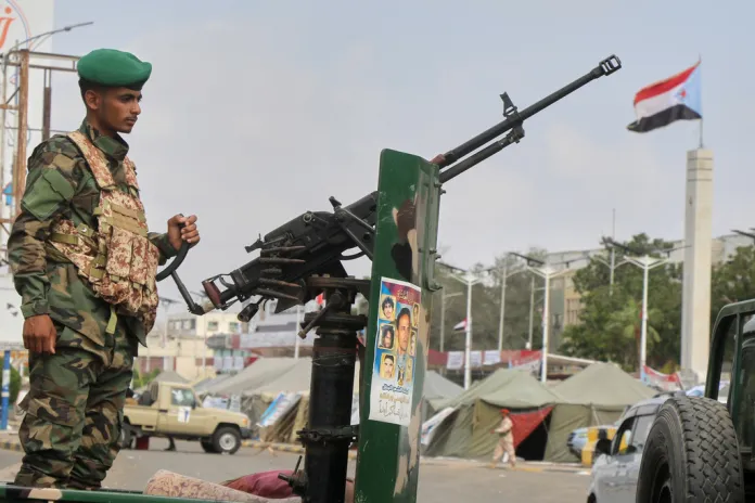 A Southern Yemen soldier of the Southern Transitional Council stands at a checkpoint.