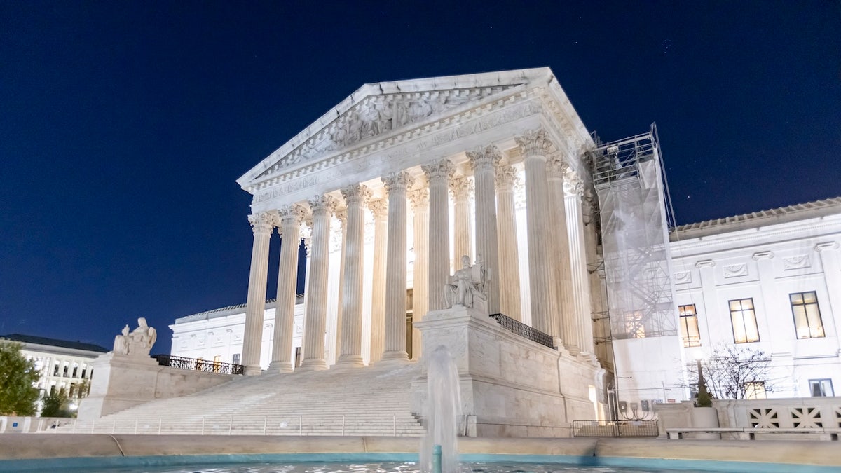 Night view of the Supreme Court of the United States known as SCOTUS in Washington D.C. with the round water fountain.The Main Entrance with lights, the West Facade with the marble Pediment and the inscription EQUAL JUSTICE UNDER LAW. The Supreme Court Building illuminated during the night. The historical building houses the Supreme Court of the United States, referred to as The Marble Palace, the building serves as the official workplace of the Chief Justice of the United States and the eight associate justices of the Supreme Court. It is located at 1 First Street in Northeast Washington, D.C., in the block immediately east of the United States Capitol and north of the Library of Congress. The building is managed by the Architect of the Capitol and is designated a National Historic Landmark The Supreme Court is the highest court in the federal judiciary of the United States. It has ultimate appellate jurisdiction over all federal court cases, and over state court cases that involve a point of U.S. Constitutional or federal law. Washington DC, USA on November 8, 2024 (Photo by Nicolas Economou/NurPhoto via Getty Images)