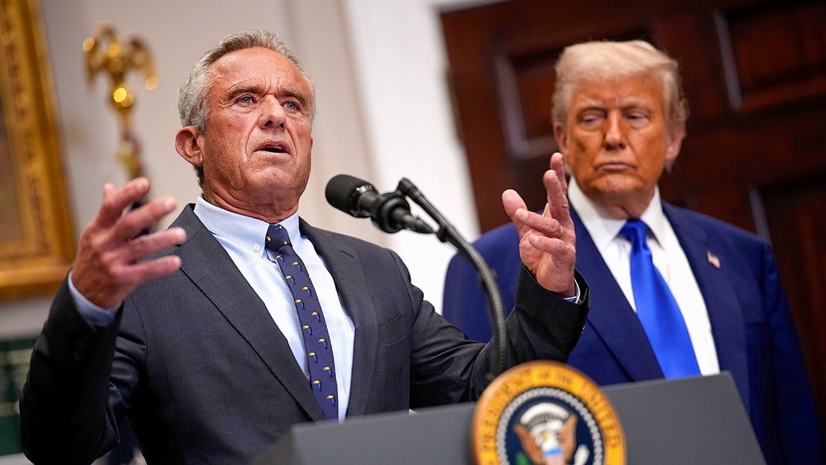 RFK Jr. speaks as Donald Trump watches