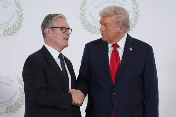 President Donald Trump greets U.K. Prime Minister Keir Starmer.