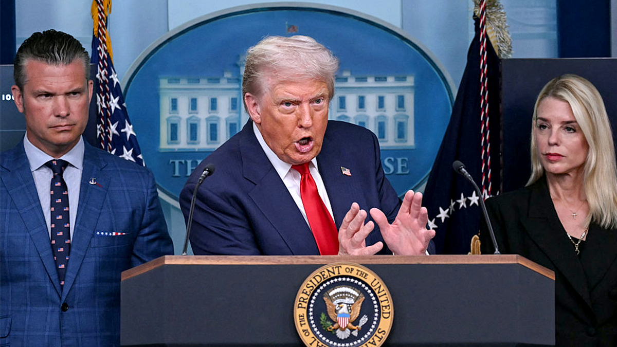 President Donald Trump, alongside Secretary of Defense Pete Hegseth and Attorney General Pam Bondi, speaks during a news conference