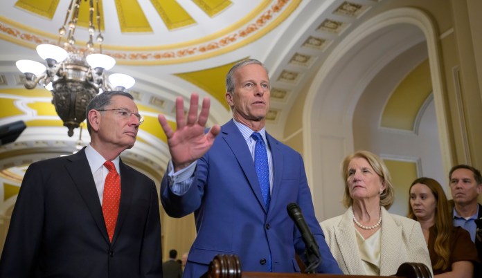 Senate Majority Leader John Thune, R-S.D., center, is joined by Sen. John Barrasso, R-Wyo., left, and Sen. Shelley Moore Capito, R-W.Va., right, during a news conference at the Capitol, Tuesday, Jan. 13, 2026, in Washington. (AP Photo/Rod Lamkey, Jr.)